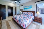 Master suite 1 with king bed, ocean view and en suite bathroom